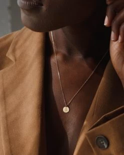 Fingers Crossed Necklace 13 Fingers Crossed Necklace -Gldn Shop FingersCrossedEmojiNecklace Gold PLPMain e80cd03b b563 4019 8b8a 72bcc96dcc21