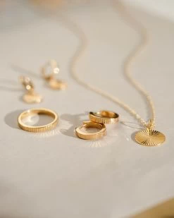 Radiant Charm Huggie Hoops -Gldn Shop GLD 7582 71969c0e 05e0 4ede a41a 0846332fbbc6