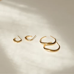 Flow Hoops -Gldn Shop gold curve hoop earrings