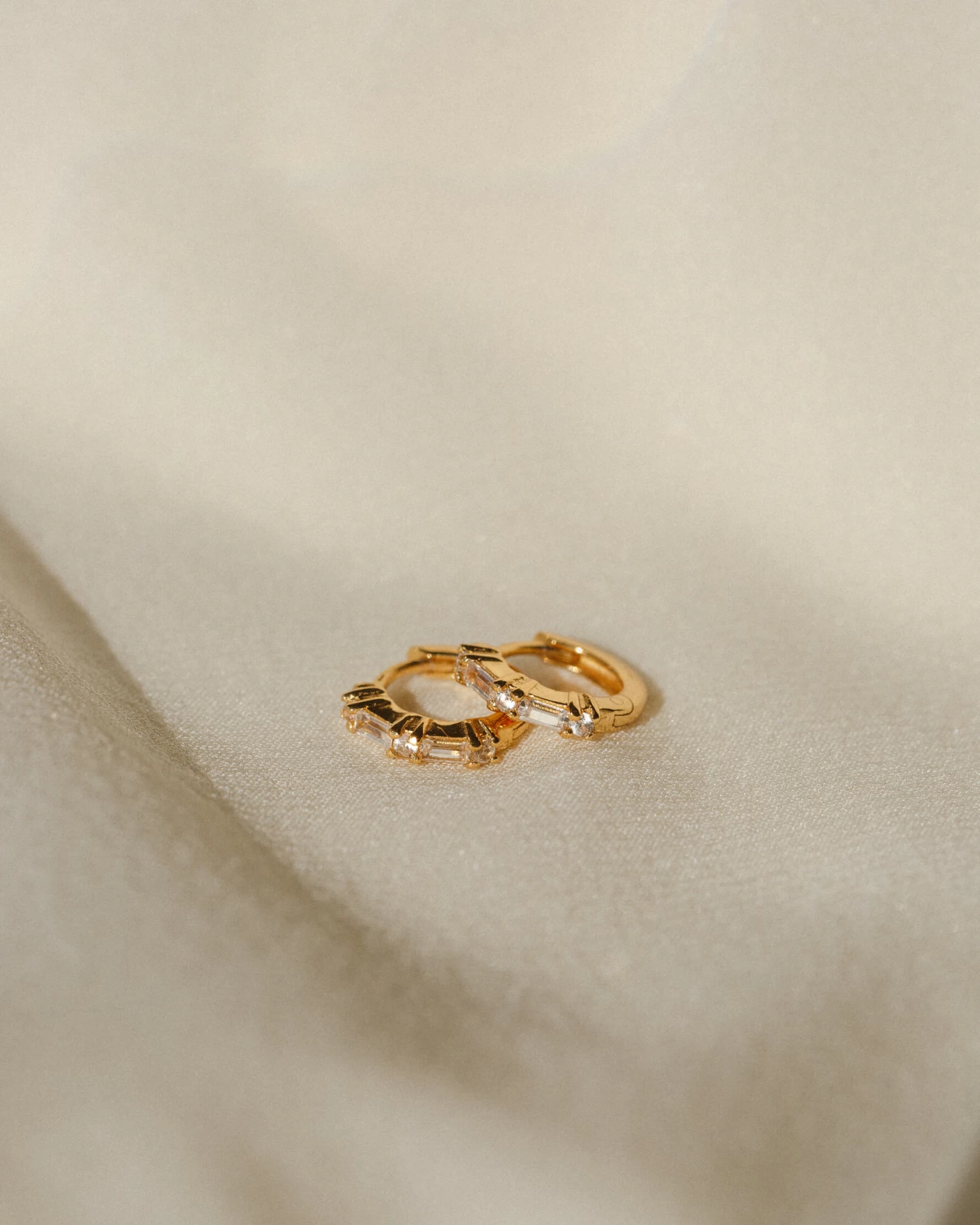 Grace White Sapphire Huggie Hoops 4 Grace White Sapphire Huggie Hoops - Image 2