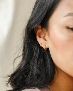 Collette Huggie Hoops -Gldn Shop model earings 10339