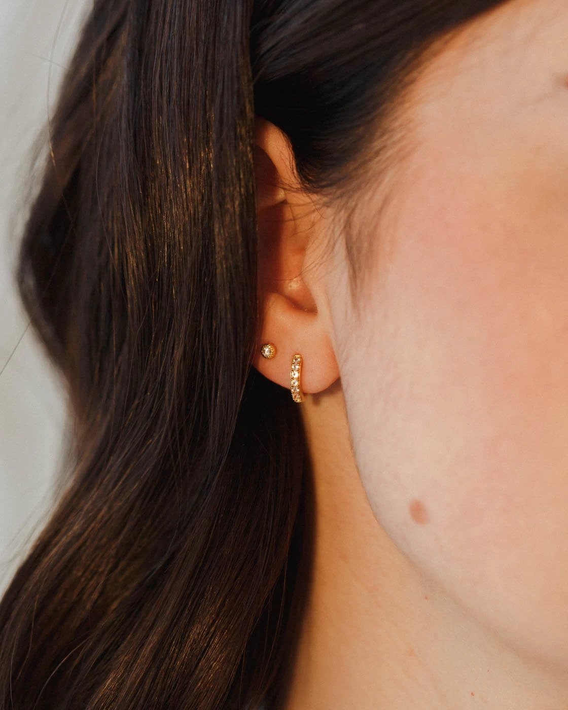 Olivia White Sapphire Huggie Hoops 7 Olivia White Sapphire Huggie Hoops - Image 5